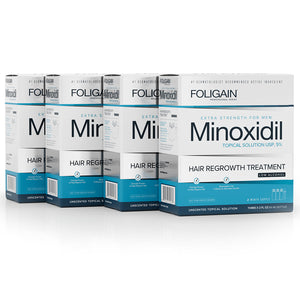 Boxes of FOLIGAIN Men’s Minoxidil 5% Topical Solution in blue and white low-alcohol packaging.
