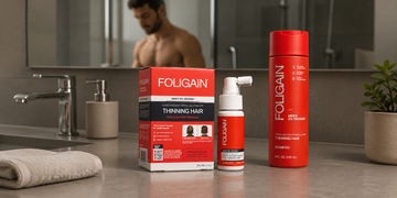 FOLIGAIN men’s TRIOXIDIL topical treatment and shampoo arranged on a bathroom counter.
