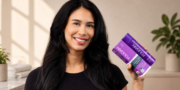 Woman holding FOLIGAIN women’s Triple Action Shampoo with 2% TRIOXIDIL, bottle and box.